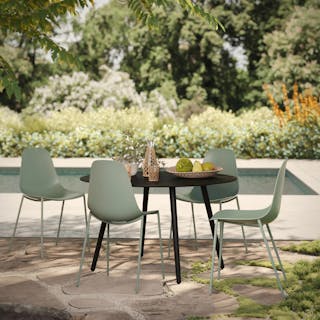 The Smooth Operator Bundle, contains products [Ballo 47" Outdoor Dining Table - Black] and [Svelti Dining Chair - Aloe Green].