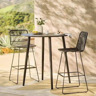 The Ballo x Selka Patio Bundle, contains products [Ballo Outdoor Bar Table - Black] and [Selka Outdoor Bar Stool - Black].