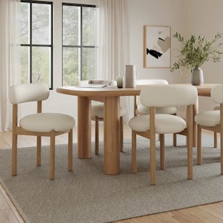 The (Extended) Gourmet Gathering Bundle, contains products [Adel 82.5" Dining Table - White Oak] and [Munk Dining Chair - White Oak and Ivory Wool Bouclé].