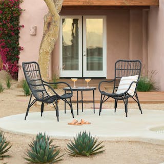 The Medan x Gera Lounge Bundle, contains products [Medan 25" Outdoor Lounge Chair - Graphite] and [Gera Outdoor Large Side Table - Black Granite].