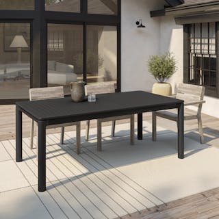 The Fisk x Lyle Dining Bundle, contains products [Fisk 75.5" - 96" Outdoor Extendable Dining Table - Black] and [Lyle Outdoor Stackable Dining Armchair - Weathered Acacia].