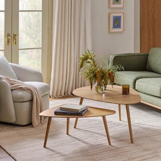 The Amoeba Coffee Table Bundle, contains products [Amoeba 42.5" Coffee Table - White Oak] and [Amoeba 29.5" Coffee Table - White Oak].