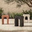 Bixby Outdoor Concrete Side Table - Sea Black - Gallery View 1 of 4.