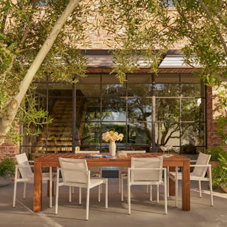 Avalon 74.5" - 98" Extendable Table x Tola Chair Bundle, contains products [Avalon 74.5" - 98" Outdoor Extendable Dining Table - Acacia], [Tola Outdoor Stackable Textilene Dining Armchair - White] and [Tola Outdoor Stackable Textilene Dining Chair - White].