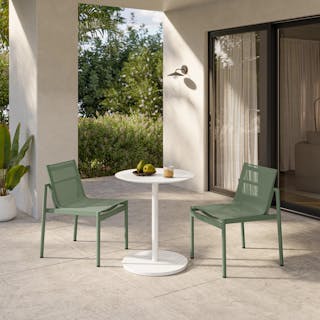 The Anders Cafe Table x Tola Dining Chair Bundle, contains products [Anders Outdoor Cafe Table - White] and [Tola Outdoor Stackable Textilene Dining Chair - Khaki Green].