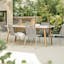 The Atra Outdoor Dining Table x Zina Dining Chair Bundle - Gallery View 1 of 6.
