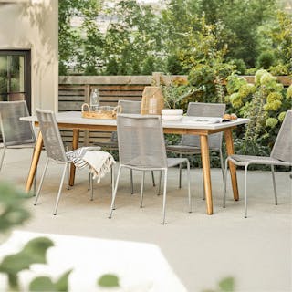 The Atra Outdoor Dining Table x Zina Dining Chair Bundle - Primary View 1 of 6 (Click To Zoom).