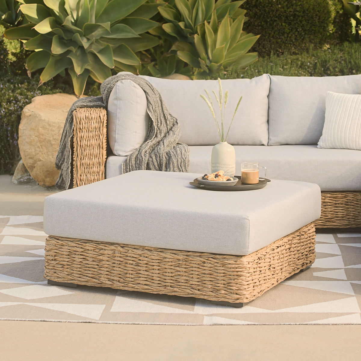 Capra Wicker & Beach Sand Fabric Outdoor Ottoman | Article