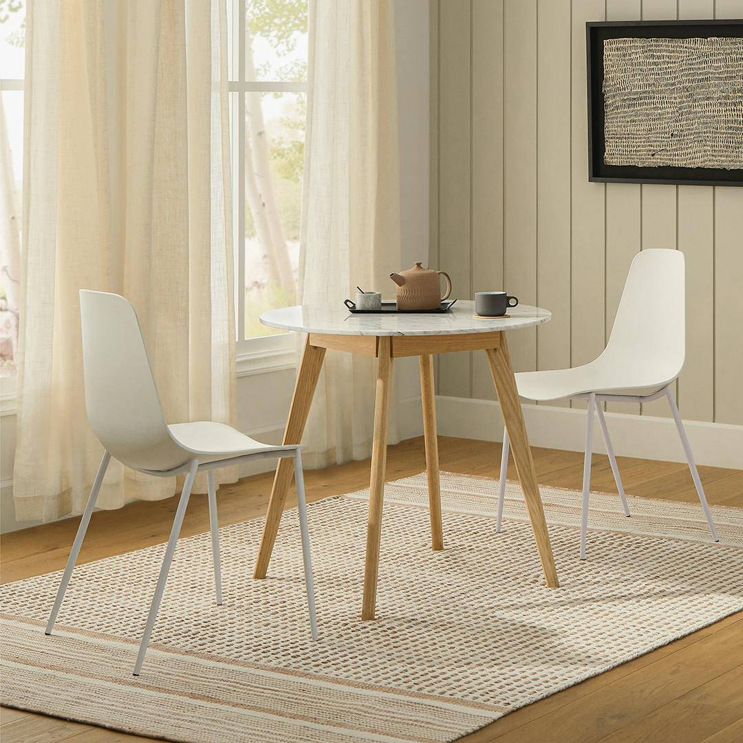 Pure White Polypropylene Armless Dining Chair | Svelti | Article