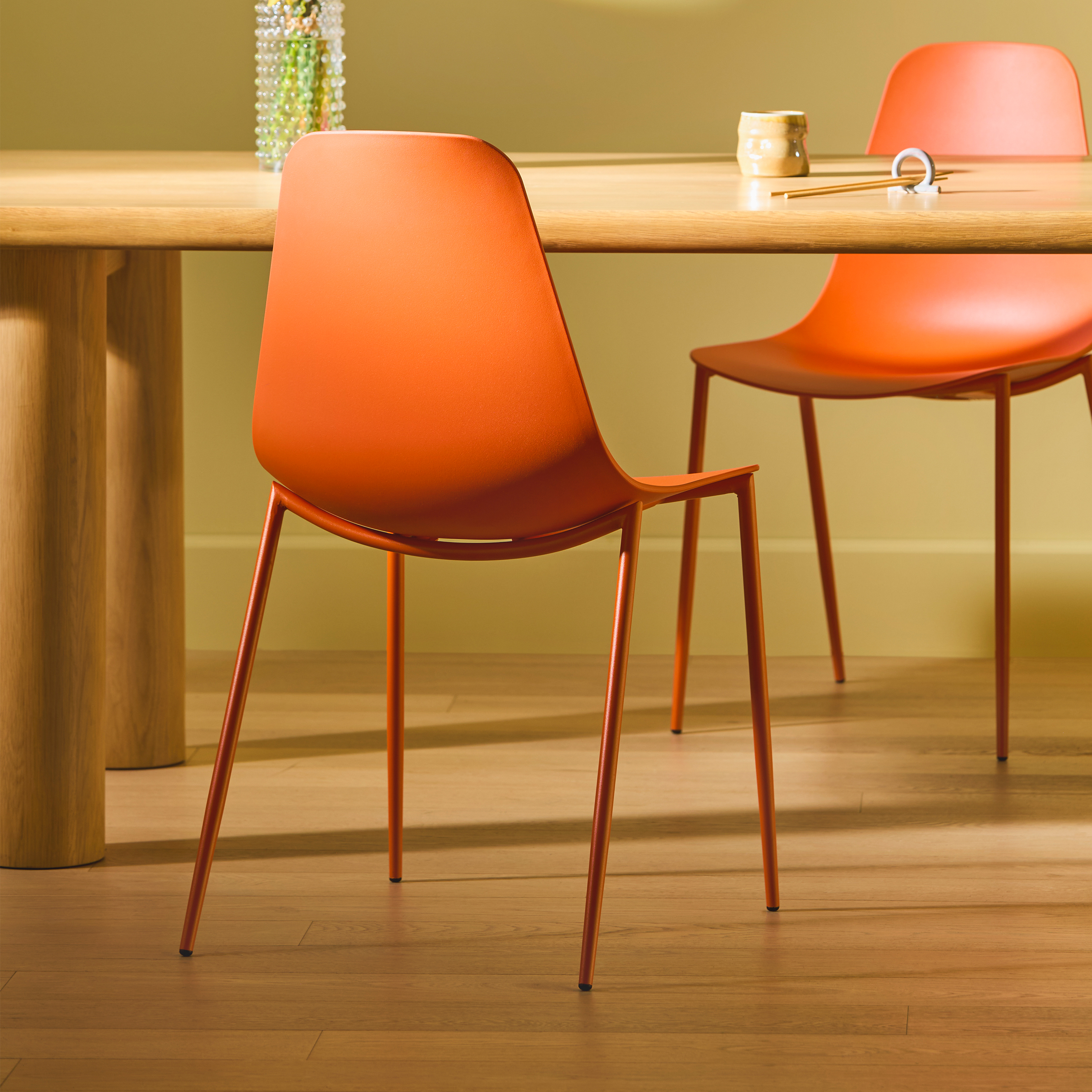 Begonia Orange Polypropylene Armless Dining Chair | Svelti | Article