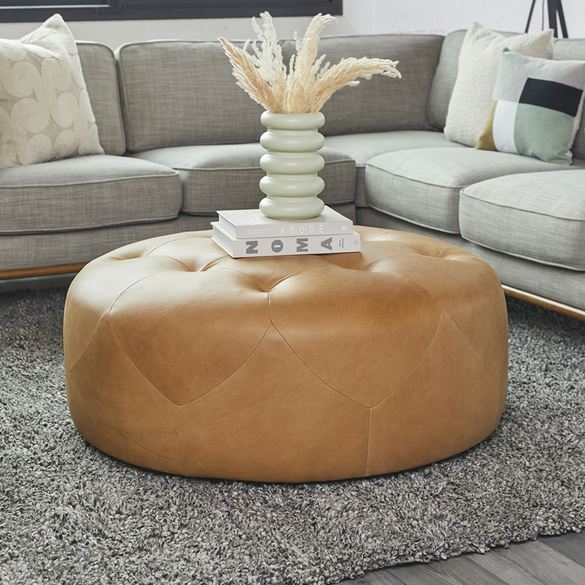 Round Charme Tan Leather Ottoman | Timpani | Article