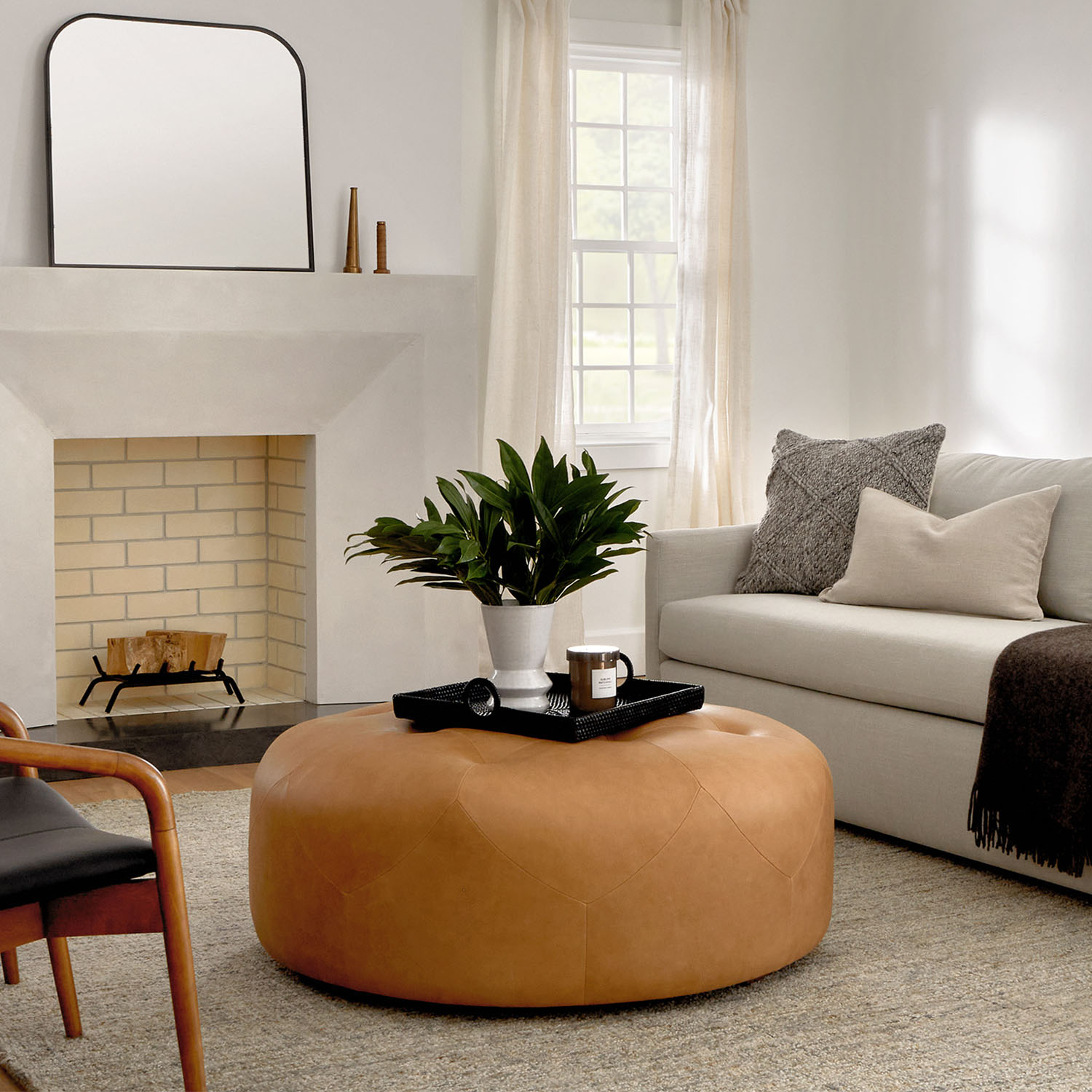 Round Charme Tan Leather Ottoman Timpani Article